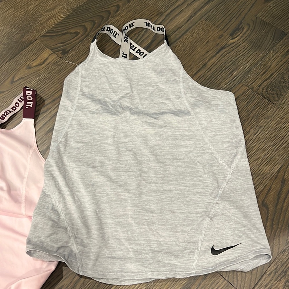 Two Nike racer back tank tops